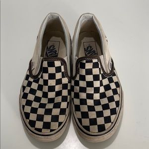 Checkered Vans slip ons